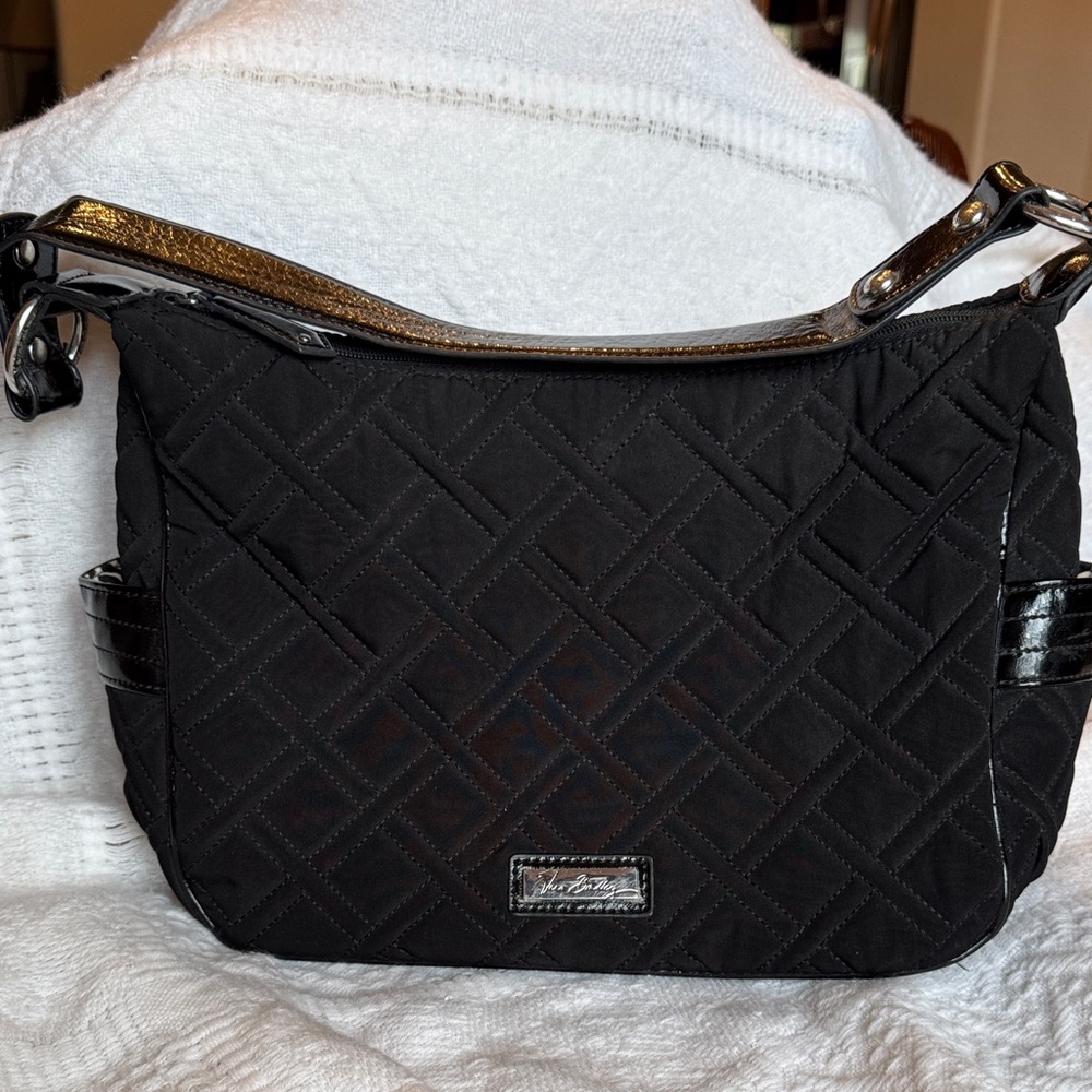 Vera Bradley Black Quilted Shoulder Bag with 4 silver bottom feet Zip closure